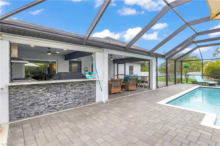 Whether it’s a pool party or a family BBQ, this backyard handles it all in style.