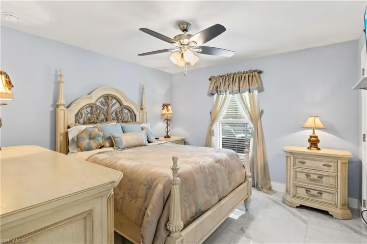 Spacious and stylish, guest bedroom offers comfort, natural light, and flexibility for family or visitors.