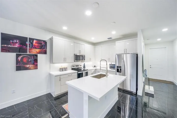 Kitchen & Foyer Entry (Right)