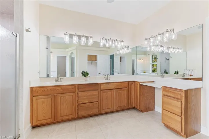 Primary bathroom with dual sinks.