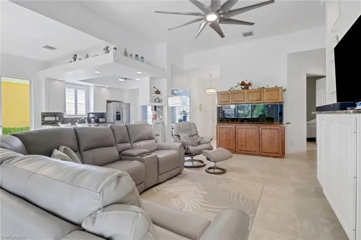 Living room featuring ceiling fan