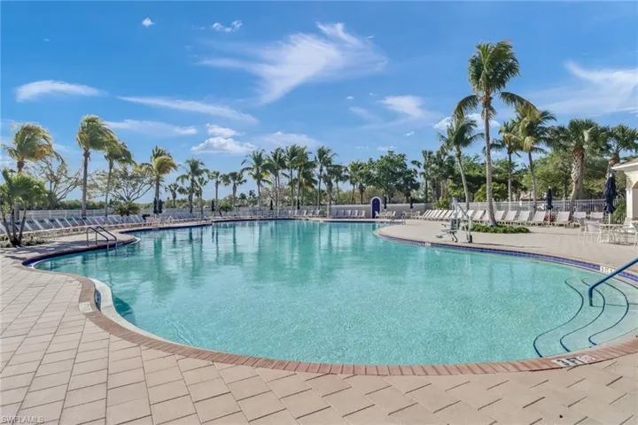 Community pool with a patio area