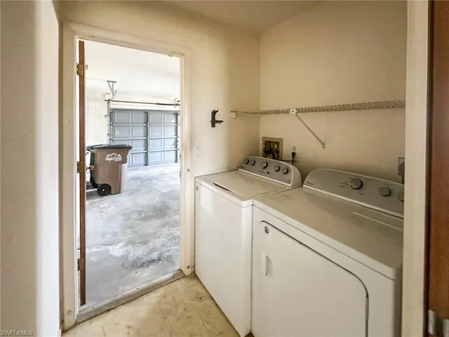 Laundry area and entrance to the garage