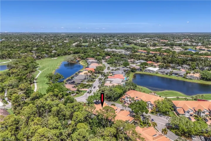 Birds eye view of property with a residential view, a water view, and golf course view