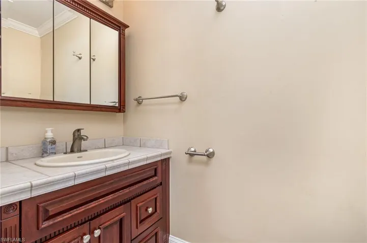 1/2 Bath located in Bedroom 4 features vanity and toile.  now shower.