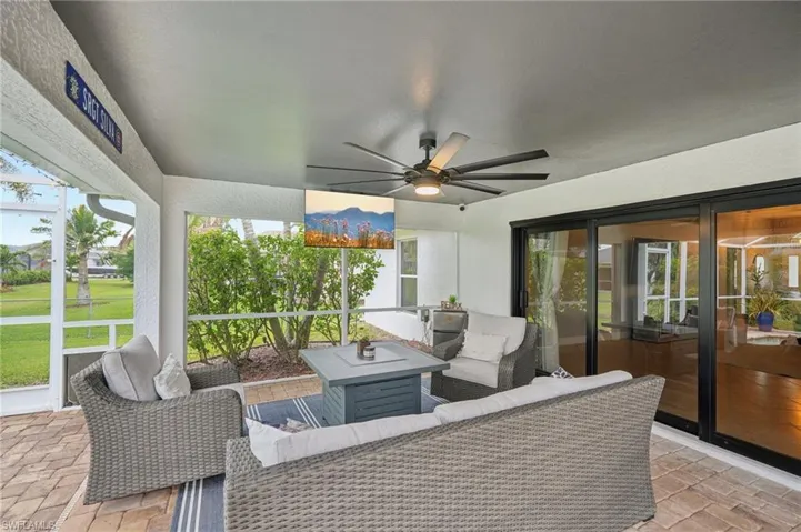 View of patio featuring a ceiling fan and an outdoor lounge area
