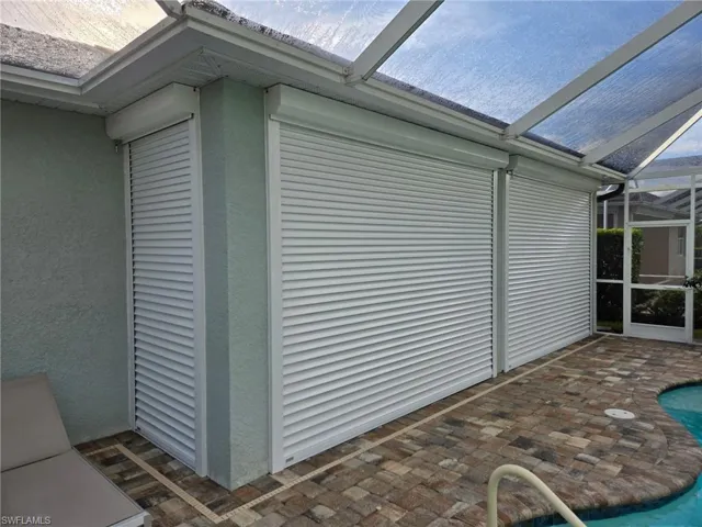 Covered lanai w/roll-down shutters