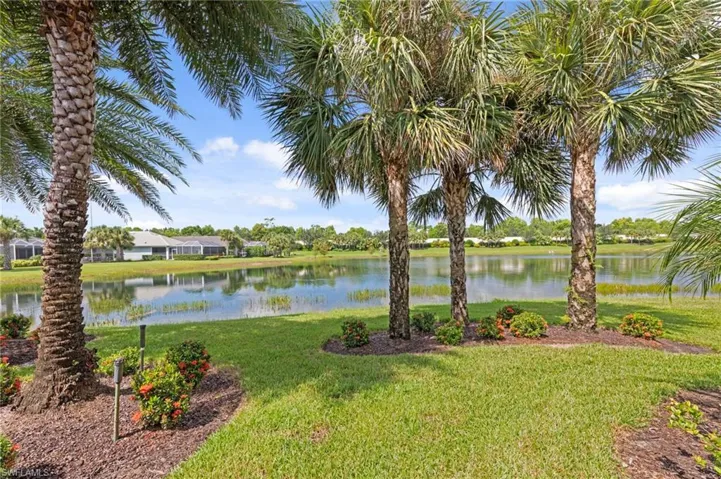 Landscaped back yard overlooking lake