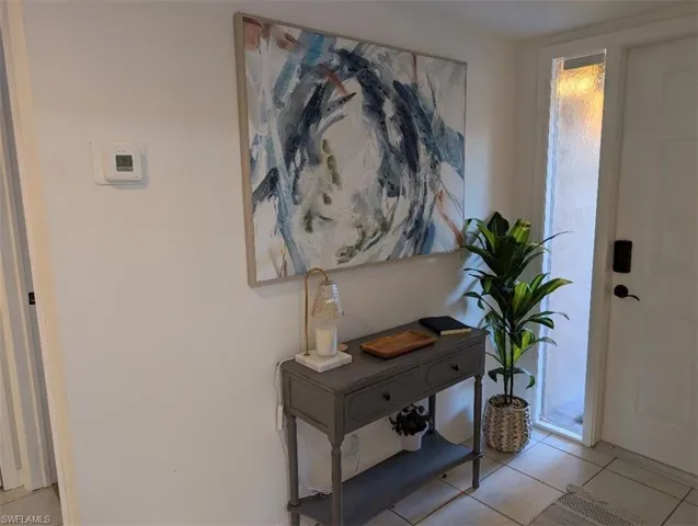 Foyer with tile patterned floors