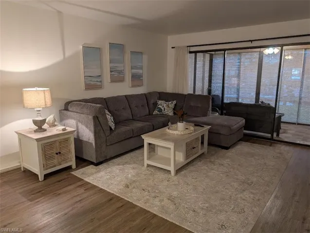 Living room featuring wood finished floors