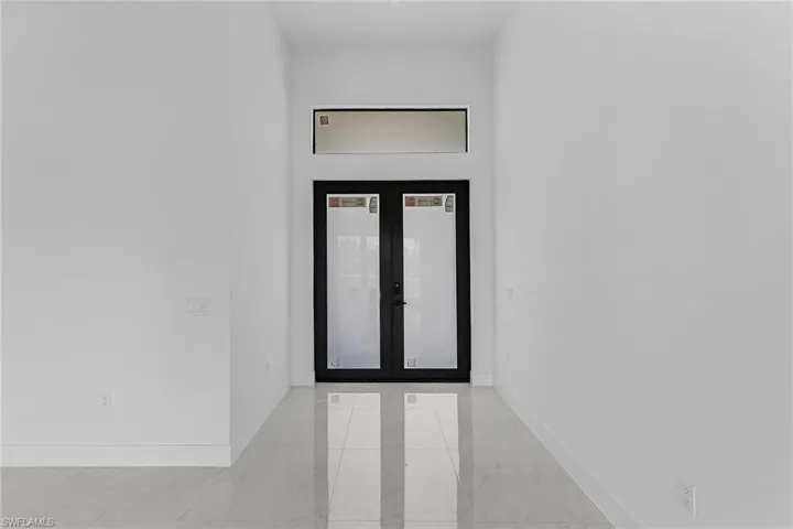 Entrance to property with french doors