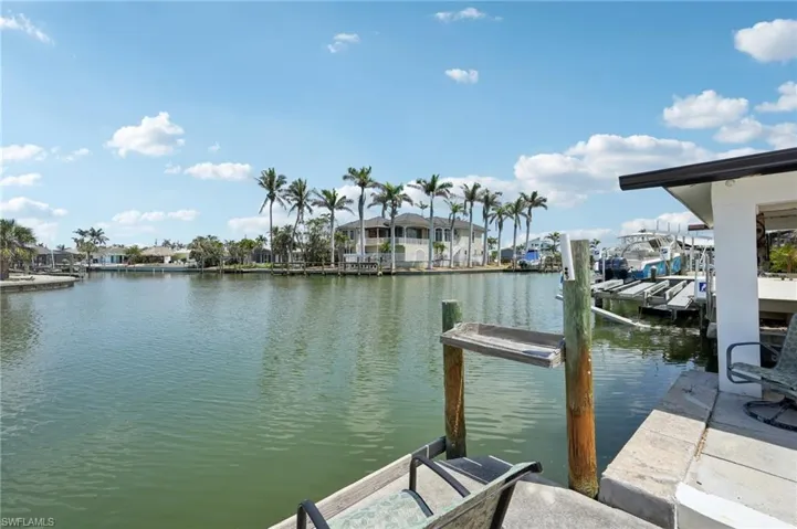 Dock featuring a water view