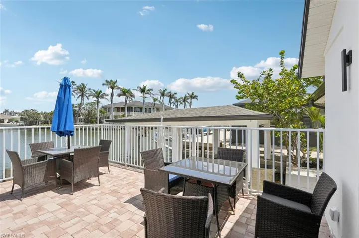 View of patio with outdoor dining area