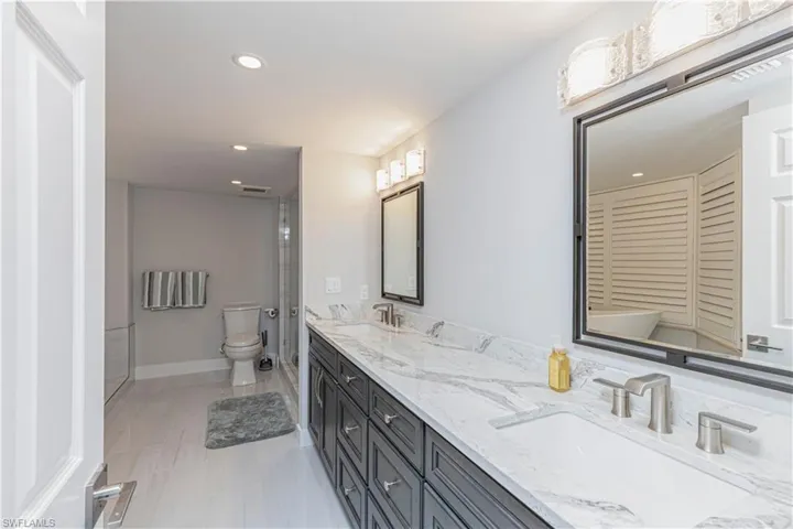 Bathroom with vanity and toilet