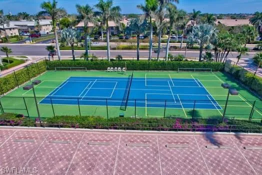 View of tennis court with fence