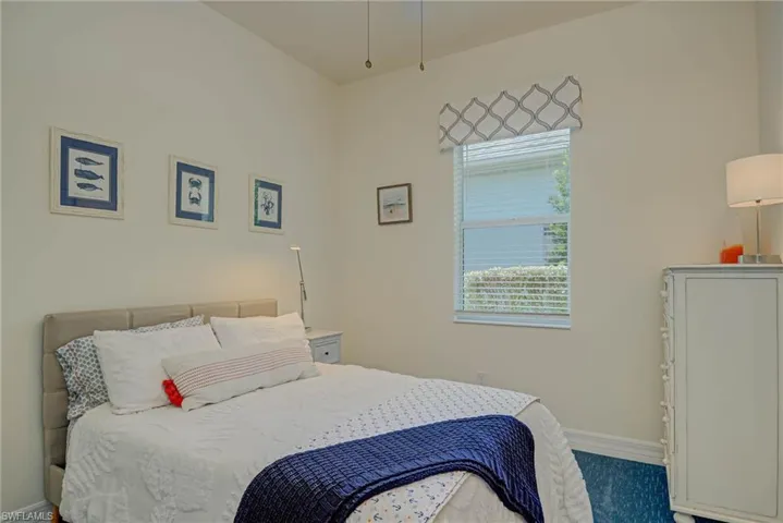 Bedroom featuring baseboards