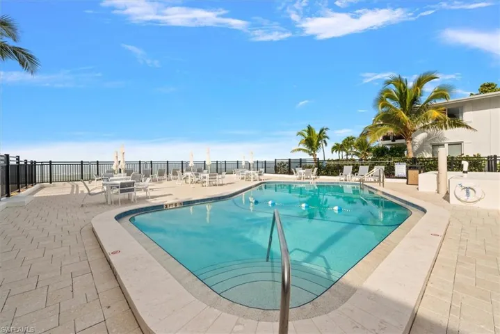 Beach Front Community pool with a patio area