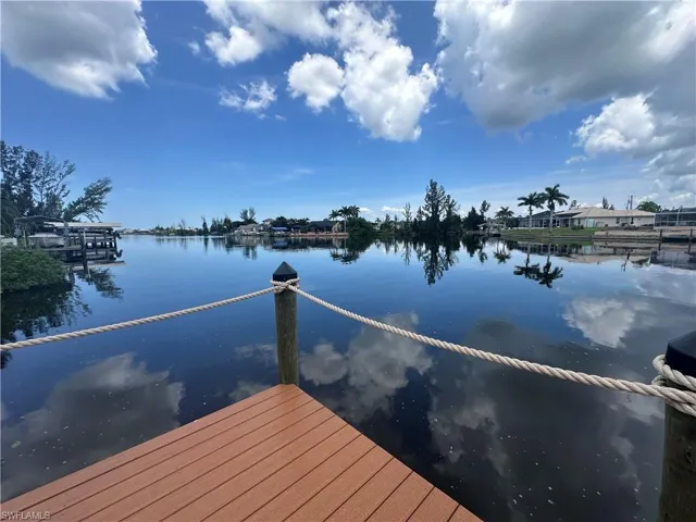 Dock featuring a water view