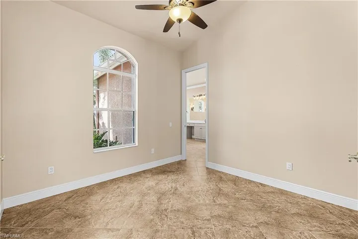 Bedroom featuring a ceiling fan