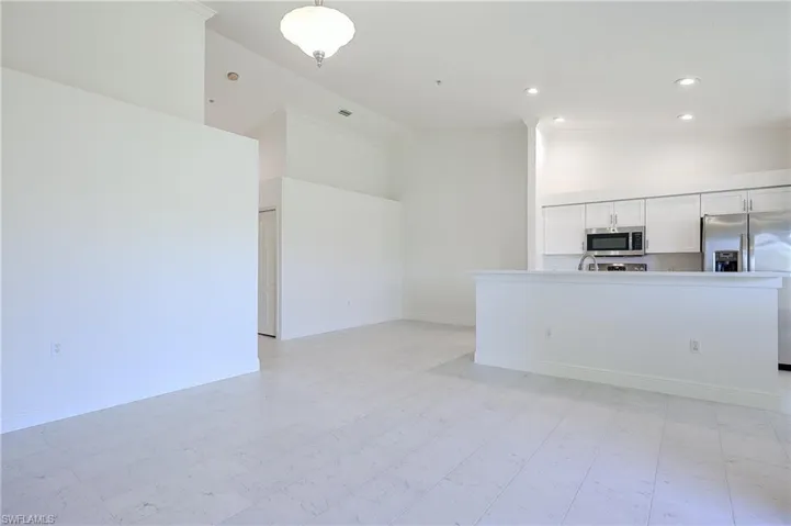 View from Great Room to Dining Area and Kitchen