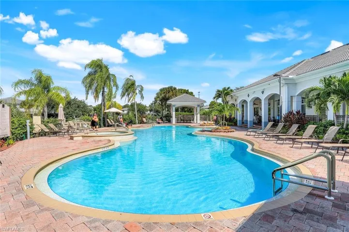 Community pool with a gazebo and a patio