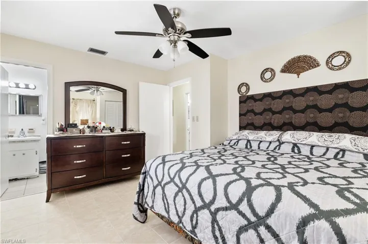 Bedroom featuring a ceiling fan