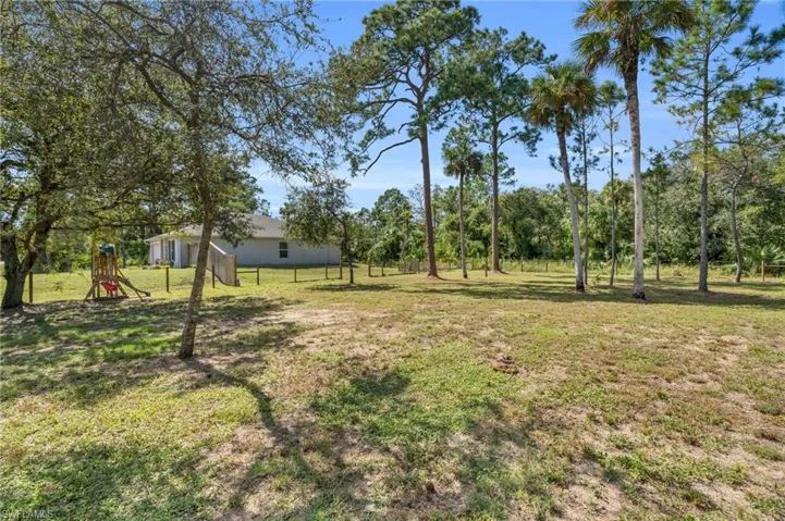 View of yard featuring a playground