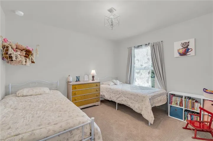 Bedroom featuring carpet flooring