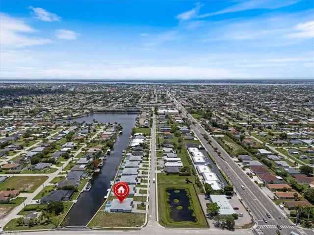 Aerial view of residential area with a large body of water