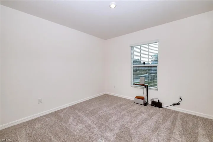 Primary Bedroom w carpet