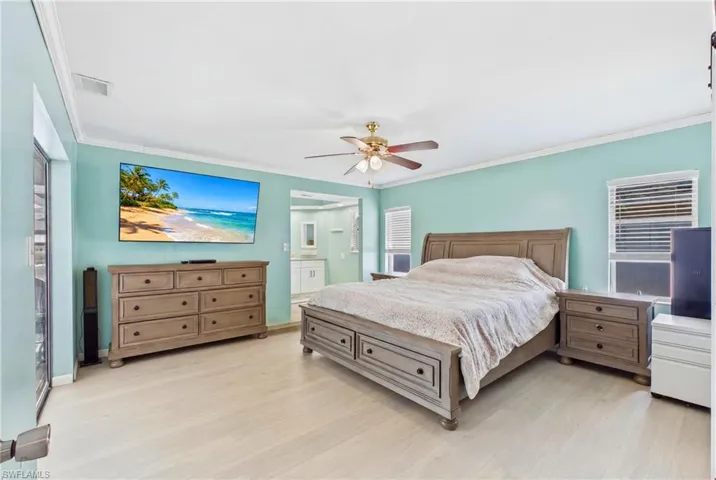 Escape to your private waterfront retreat in this spacious and serene primary suite.