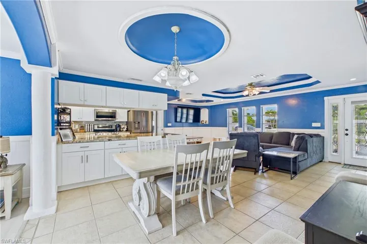 Enjoy every meal with beautiful waterfront views in this bright and inviting dining space.