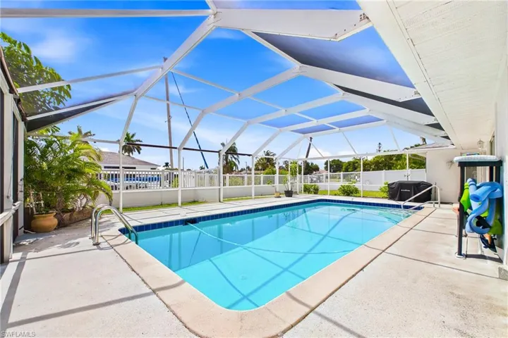 Relax poolside while enjoying peaceful canal views and year-round sunshine.