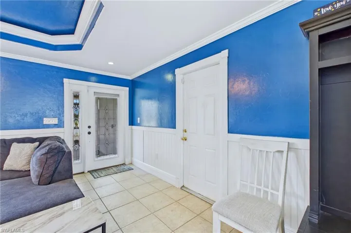 A warm and welcoming entrance sets the stage for the stylish finishes and spacious living areas found throughout the home.