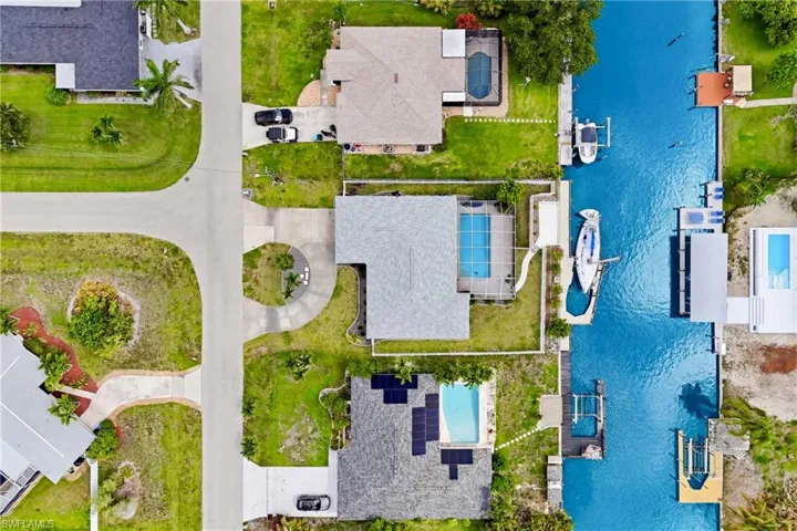 Discover the true beauty of this Gulf-access property from above, where waterfront living and boating convenience take center stage.