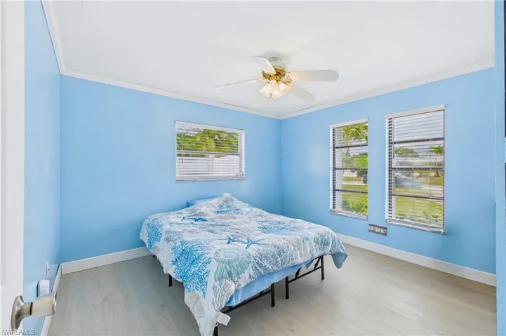 Cozy yet roomy, this guest bedroom is ready to accommodate visitors in comfort.
