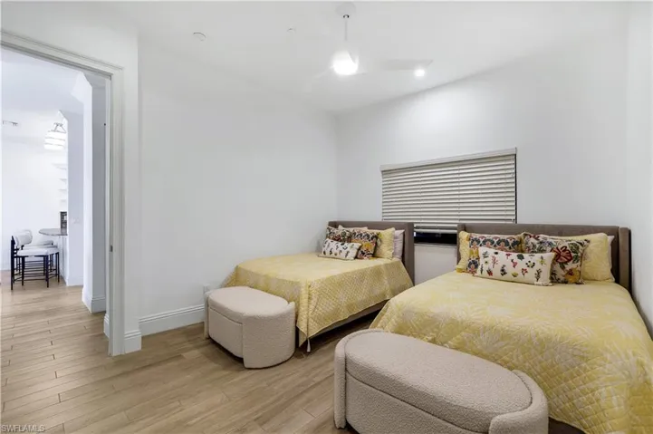 Bedroom with light hardwood / wood-style floors