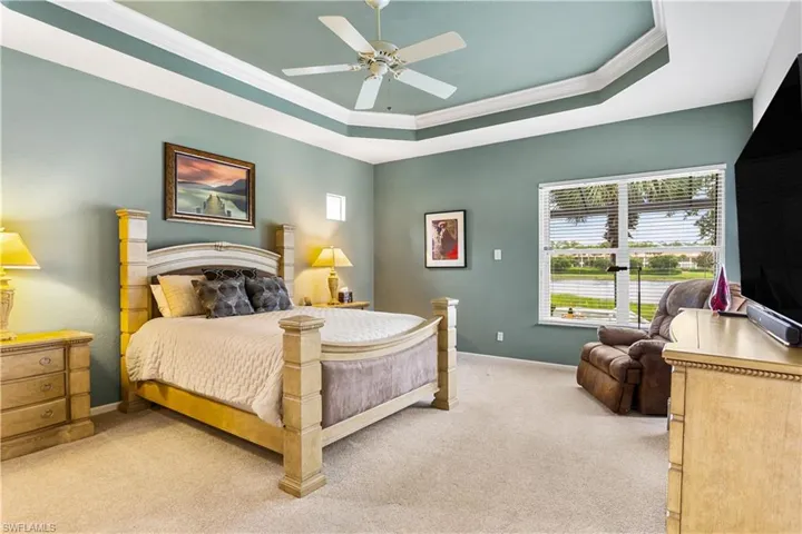 Primary Bedroom with detailed ceiling