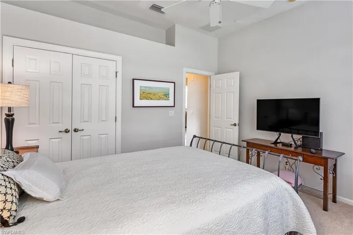 Guest bedroom has nice closet with built-ins