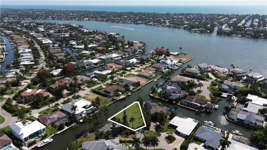 View of property location featuring nearby suburban area and property boundaries highlighted