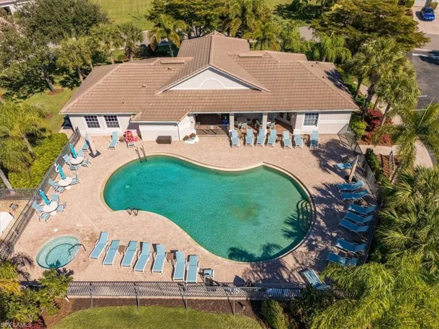 Community pool with a patio area