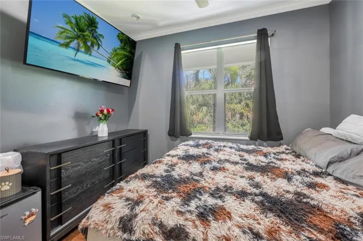 Bedroom with crown molding