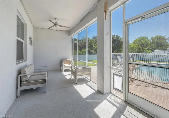 Patio / solarium featuring a ceiling fan