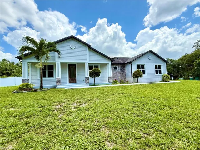 Ranch-style home with a porch