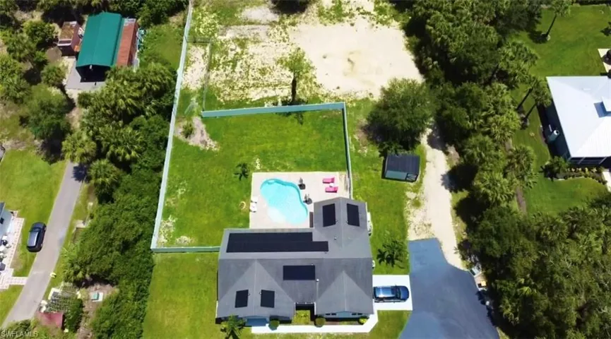View of property location featuring property parcel outlined and a pool