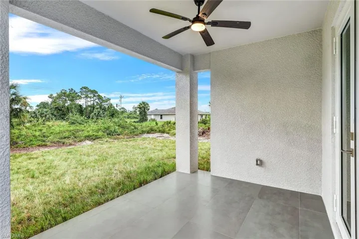 View of patio with ceiling fan