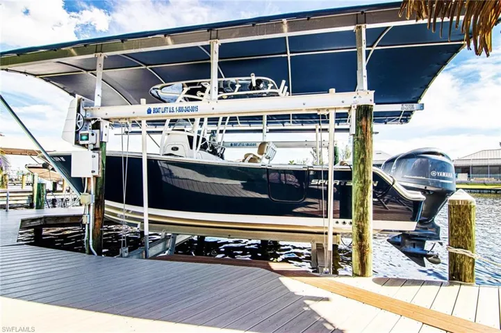 Dock area with 1st boat lift and boat canopy Boat for sale separately