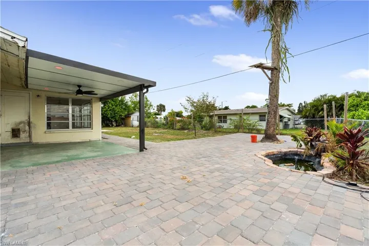 View of patio featuring ceiling fan