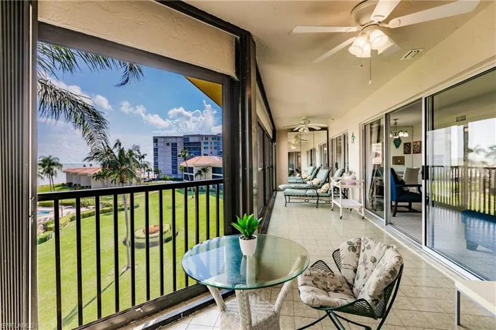 Balcony featuring ceiling fan