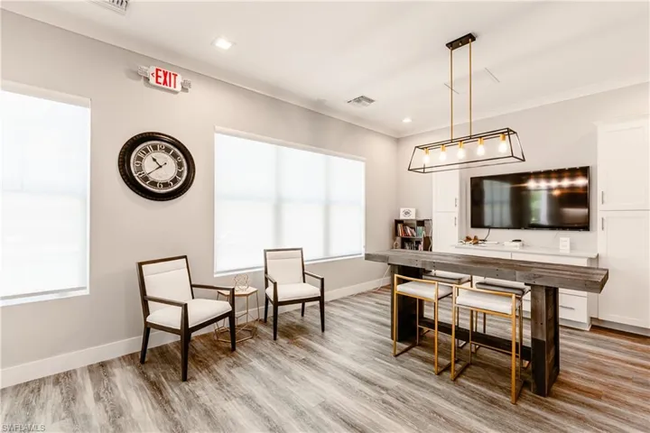 Community Dining space featuring wood-type flooring